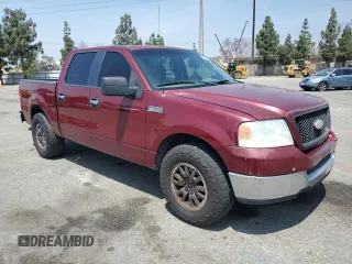 2005 Ford F-150 XLT with VIN 1FTPW125X5KF09293, listed as a Copart auction lot 60921515 with 154,521 mi miles and Salvage title. Bid and sale history available at DreamBid. Image 4.