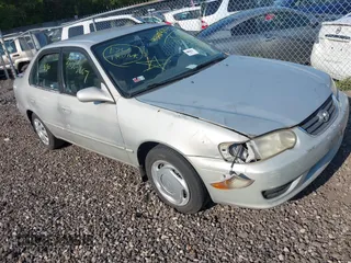 2001 Toyota Corolla CE with VIN 2T1BR12E61C473602, listed as a IAAI auction lot 42408733 with Not provided miles and . Bid and sale history available at DreamBid. Image 1.