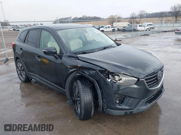 2016 Mazda CX-5 Grand Touring with VIN JM3KE4DY3G0769448, listed as a IAAI auction lot 41947725 with 154,051 mi miles and . Bid and sale history available at carsss.com. Image 6.