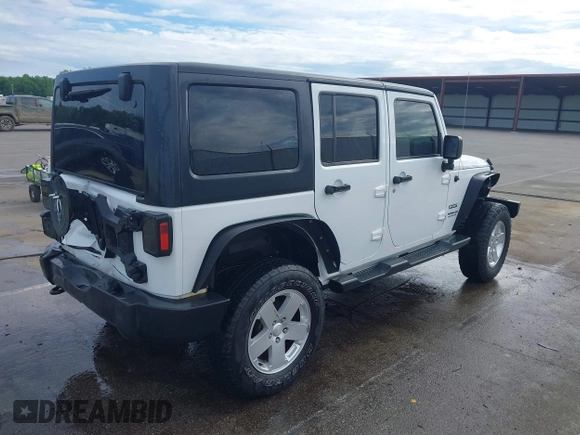 2013 Jeep Wrangler Unlimited Sport with VIN 1C4BJWDG4DL599151, listed as a IAAI auction lot 42212831 with 143,865 mi miles and . Bid and sale history available at DreamBid. Image 4.