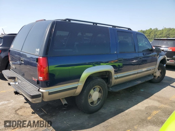 1999 GMC Suburban z VIN 3GKFK16R2XG544767, wystawiony jako Copart lot #67078414 z przebiegiem 154 145 mil mil oraz Szkoda całkowita • Salvage title. Historia ofert i sprzedaży dostępna na DreamBid. Obrazek 3.