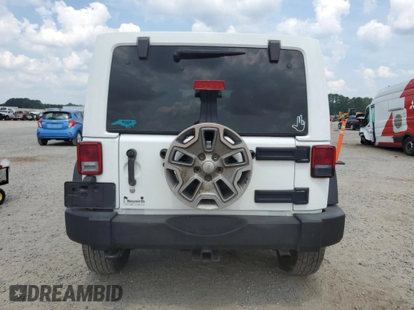 2016 Jeep Wrangler Unlimited Rubicon с VIN 1C4BJWFGXGL349057, выставлен на аукционе Copart как лот 61608945 с пробегом 118 200 миль миль и Списание • Salvage title. История ставок и продаж доступна на DreamBid. Изображение 6.
