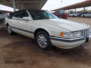 1996 Cadillac Seville Luxury SLS with VIN 1G6KS52Y0TU816483, listed as a IAAI auction lot 42010162 with 1 mi miles. Bid and sale history available at carsss.com. Image 1.