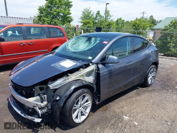 2023 Tesla Model Y Long Range with VIN 7SAYGAEE7PF615751, listed as a IAAI auction lot 42297819 with 31,201 mi miles and . Bid and sale history available at DreamBid. Image 21.