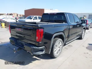 2020 GMC Sierra 1500 Denali with VIN 1GTU9FEL6LZ173499, listed as a IAAI auction lot 41856799 with 77,723 mi miles and . Bid and sale history available at DreamBid. Image 4.