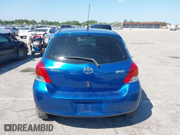 2009 Toyota Yaris with VIN JTDKT903X95257701, listed as a IAAI auction lot 41796420 with 86,953 mi miles. Bid and sale history available at carsss.com. Image 17.