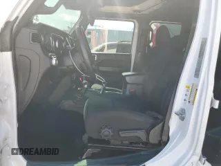 2019 Jeep Wrangler Unlimited Sport Altitude with VIN 1C4HJXDG2KW675235, listed as a Copart auction lot 54389785 with 88,825 mi miles and Salvage title. Bid and sale history available at DreamBid. Image 7.