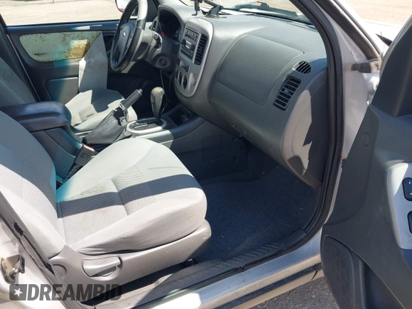 2005 Ford Escape XLT with VIN 1FMYU931X5KB49605, listed as a IAAI auction lot 42162371 with 153,816 mi miles and . Bid and sale history available at DreamBid. Image 5.