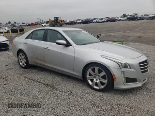 2016 Cadillac CTS Luxury Collection RWD with VIN 1G6AR5SX6G0197237, listed as a Copart auction lot 56484275 with 127,761 mi miles and Salvage title. Bid and sale history available at DreamBid. Image 4.