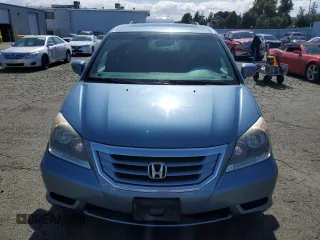 2010 Honda Odyssey EX-L with VIN 5FNRL3H75AB023925, listed as a Copart auction lot 51528745 with 134,982 mi miles and Salvage Title. Bid and sale history available at carsss.com. Image 5.