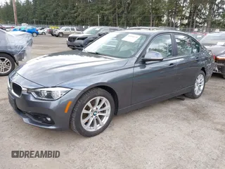 2018 BMW 3 Series 320i xDrive with VIN WBA8E5G53JNV03333, listed as a IAAI auction lot 42018275 with 45,950 mi miles. Bid and sale history available at carsss.com. Image 2.