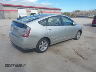 2005 Toyota Prius with VIN JTDKB20U653014332, listed as a IAAI auction lot 42010139 with 128,147 mi miles. Bid and sale history available at carsss.com. Image 4.