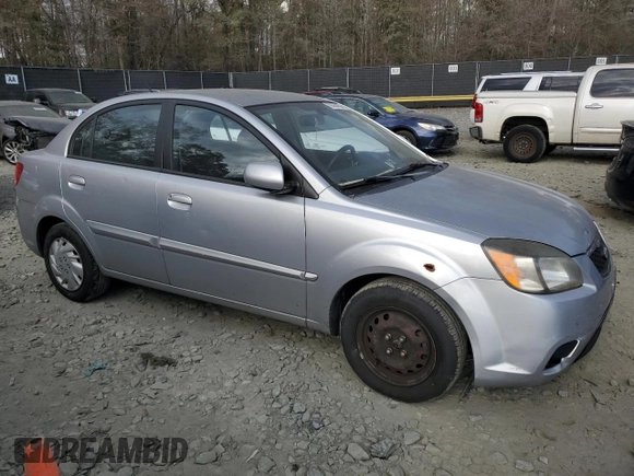 2010 Kia Rio LX with VIN KNADH4A38A6627955, listed as a Copart auction lot 43702265 with 138,005 mi miles and Non Repairable. Bid and sale history available at carsss.com. Image 4.