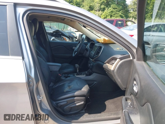 2015 Jeep Cherokee Latitude with VIN 1C4PJMCS2FW789144, listed as a IAAI auction lot 42837222 with 99,759 mi miles and . Bid and sale history available at DreamBid. Image 5.
