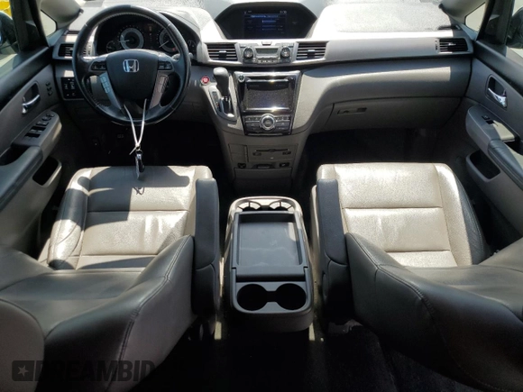 2017 Honda Odyssey Touring z VIN 5FNRL5H99HB007993, wystawiony jako Copart lot #60501805 z przebiegiem 104 628 mil mil oraz Szkoda całkowita • Salvage title. Historia ofert i sprzedaży dostępna na DreamBid. Obrazek 8.