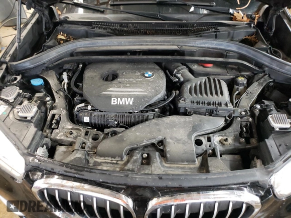 2017 BMW X1 xDrive28i with VIN WBXHT3C34H5F87048, listed as a Copart auction lot 67545012 with 76,666 mi miles. Bid and sale history available at carsss.com. Image 12.