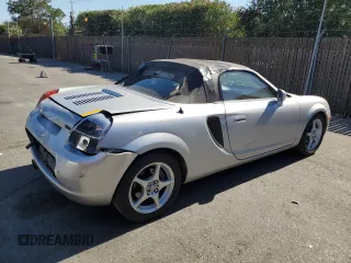 2000 Toyota MR2 z VIN JTDFR3203Y0012749, wystawiony jako Copart lot #67755424 z przebiegiem 160 195 mil mil oraz Szkody całkowita. Historia ofert i sprzedaży dostępna na DreamBid. Obrazek 3.