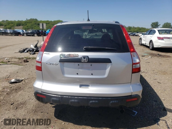 2009 Honda CR-V LX z VIN 5J6RE383X9L035529, wystawiony jako Copart lot #57875445 z przebiegiem 122 651 mil mil oraz Szkoda całkowita • Salvage title. Historia ofert i sprzedaży dostępna na DreamBid. Obrazek 6.