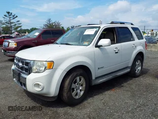 2009 Ford Escape Hybrid with VIN 1FMCU49379KA32737, listed as a IAAI auction lot 42575516 with 144,571 mi miles and . Bid and sale history available at DreamBid. Image 2.