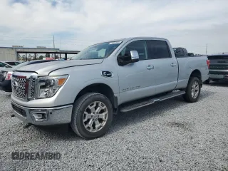 2017 Nissan Titan SL z VIN 1N6BA1F28HN515621, wystawiony jako Copart lot #44083995 z przebiegiem 119 745 mil mil oraz Czysty tytuł • Clean title. Historia ofert i sprzedaży dostępna na DreamBid. Obrazek 1.