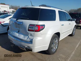 2016 GMC Acadia Denali with VIN 1GKKRTKD4GJ257624, listed as a IAAI auction lot 41769196 with 129,229 mi miles. Bid and sale history available at carsss.com. Image 4.