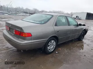 2001 Toyota Camry CE with VIN 4T1BG22K11U036462, listed as a IAAI auction lot 41606683 with 217,077 mi miles and . Bid and sale history available at DreamBid. Image 4.