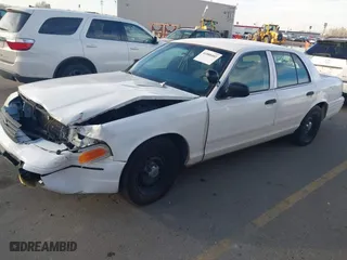 2000 Ford Crown Victoria Police Pkg Police Interceptor with VIN 2FAFP71W9YX149303, listed as a IAAI auction lot 41888402 with 148,081 mi miles. Bid and sale history available at carsss.com. Image 2.