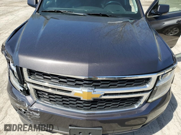2015 Chevrolet Tahoe LT z VIN 1GNSKBKC6FR156951, wystawiony jako Copart lot #54666335 z przebiegiem 156 139 mil mil oraz Szkoda całkowita • Salvage title. Historia ofert i sprzedaży dostępna na DreamBid. Obrazek 12.