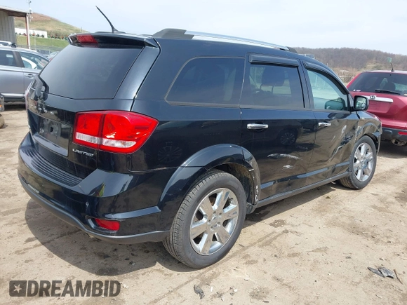2014 Dodge Journey Limited with VIN 3C4PDDDG8ET150059, listed as a IAAI auction lot 41915239 with 120,897 mi miles and . Bid and sale history available at carsss.com. Image 4.