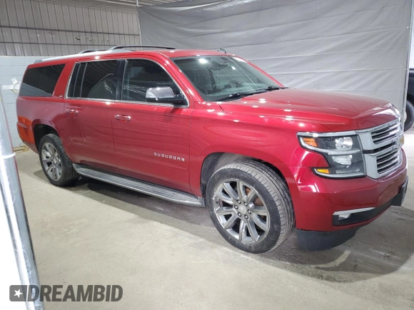2015 Chevrolet Suburban LTZ with VIN 1GNSKKKC7FR299567, listed as a Copart auction lot 52944035 with 147,964 mi miles and Salvage Title. Bid and sale history available at DreamBid. Image 4.