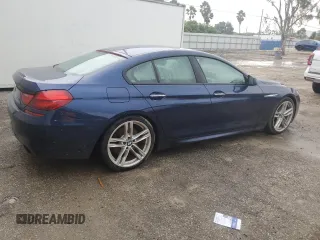 2015 BMW 6 Series 640i with VIN WBA6A0C59FGB53667, listed as a Copart auction lot 74034834 with Not Provided miles and Salvage Title. Bid and sale history available at DreamBid. Image 3.