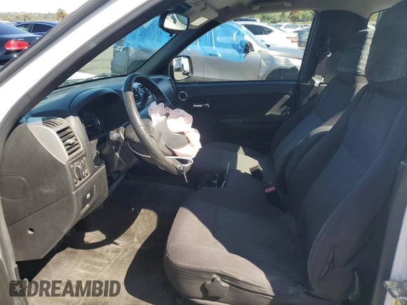 2012 Chevrolet Colorado Work Truck with VIN 1GCCSBF9XC8145058, listed as a Copart auction lot 57133065 with 261,719 mi miles and Salvage title. Bid and sale history available at DreamBid. Image 7.