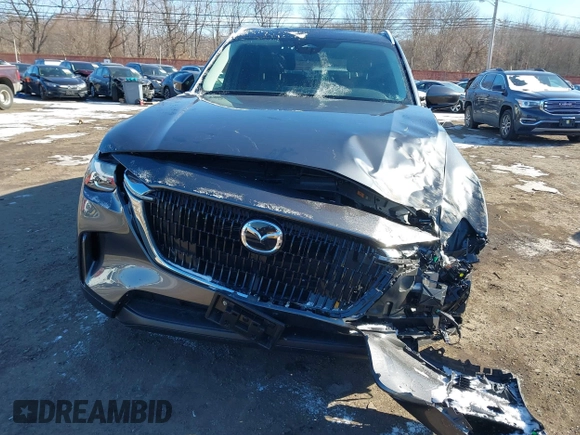 2024 Mazda CX-90 Preferred with VIN JM3KKBHDXR1146779, listed as a IAAI auction lot 41628645 with 14,744 mi miles and . Bid and sale history available at DreamBid. Image 12.