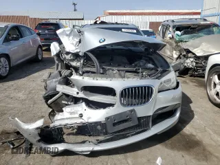 2015 BMW 7 Series 740Li with VIN WBAYE4C52FD947168, listed as a Copart auction lot 71287564 with 103,444 mi miles and Salvage Title. Bid and sale history available at DreamBid. Image 5.