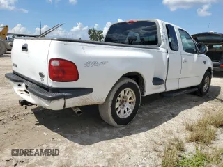 2001 Ford F-150 XL with VIN 1FTRX07L81KF40897, listed as a Copart auction lot 73887094 with 0 mi miles and Salvage Title. Bid and sale history available at carsss.com. Image 3.