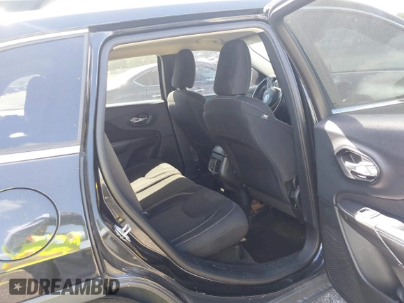 2015 Jeep Cherokee Latitude with VIN 1C4PJLCB4FW683904, listed as a IAAI auction lot 41579059 with 126,156 mi miles and . Bid and sale history available at carsss.com. Image 8.