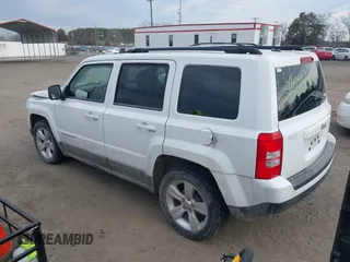 2011 Jeep Patriot Latitude with VIN 1J4NT1GB4BD126488, listed as a IAAI auction lot 41652554 with 179,724 mi miles. Bid and sale history available at carsss.com. Image 3.