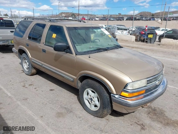 1999 Chevrolet Blazer LS with VIN 1GNDT13W1X2132656, listed as a IAAI auction lot 41784442 with 144,999 mi miles. Bid and sale history available at carsss.com. Image 1.