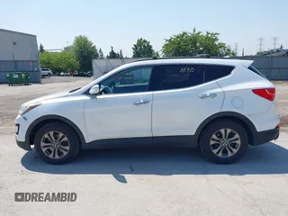 2014 Hyundai Santa Fe with VIN 5XYZUDLB9EG156555, listed as a IAAI auction lot 42721070 with 349,412 mi miles and . Bid and sale history available at DreamBid. Image 14.