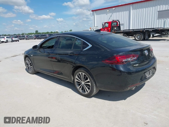 2018 Buick Regal Essence with VIN W04GP6SX5J1120700, listed as a IAAI auction lot 42334588 with 131,926 mi miles and . Bid and sale history available at DreamBid. Image 3.