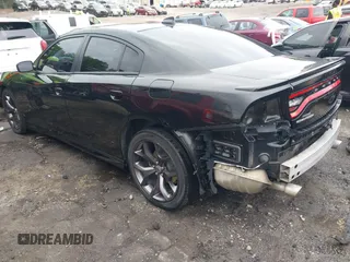 2018 Dodge Charger SXT Plus with VIN 2C3CDXHG0JH289216, listed as a IAAI auction lot 42085449 with 90,902 mi miles and . Bid and sale history available at DreamBid. Image 3.