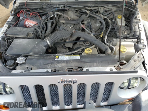 2011 Jeep Wrangler Unlimited Rubicon with VIN 1J4BA6H1XBL571187, listed as a Copart auction lot 54412505 with 83,819 mi miles and Clean title. Bid and sale history available at DreamBid. Image 12.