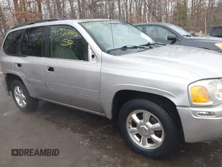 2004 GMC Envoy SLT with VIN 1GKDT13S242398113, listed as a IAAI auction lot 41722942 with 175,173 mi miles and . Bid and sale history available at DreamBid. Image 6.