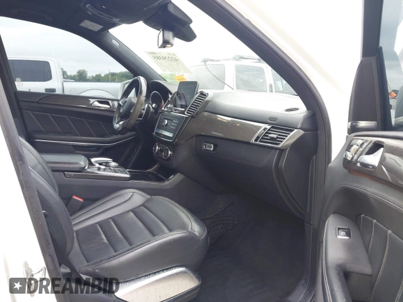 2018 Mercedes-Benz GLS 63 AMG with VIN 4JGDF7FE1JB099084, listed as a IAAI auction lot 42220385 with 97,904 mi miles and . Bid and sale history available at DreamBid. Image 5.