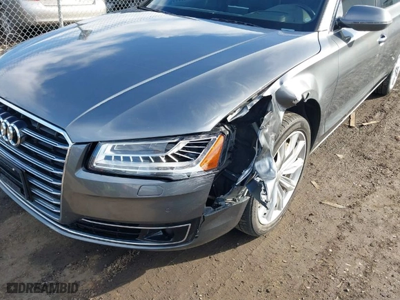 2016 Audi A8 L 3.0T with VIN WAU34AFD0GN005520, listed as a IAAI auction lot 41689248 with 76,150 mi miles. Bid and sale history available at carsss.com. Image 6.