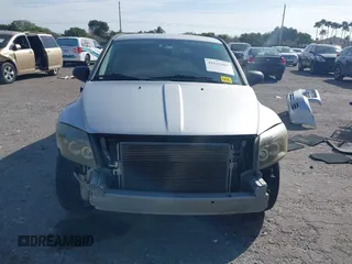 2009 Dodge Caliber SXT with VIN 1B3HB48A39D142674, listed as a IAAI auction lot 41642867 with 156,504 mi miles and . Bid and sale history available at carsss.com. Image 13.