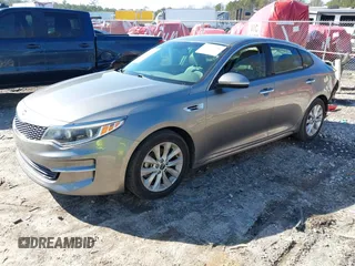 2016 Kia Optima EX with VIN 5XXGU4L3XGG052034, listed as a IAAI auction lot 41506088 with 87,509 mi miles and . Bid and sale history available at DreamBid. Image 2.