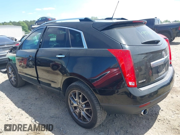2015 Cadillac SRX Performance Collection with VIN 3GYFNCE30FS549872, listed as a IAAI auction lot 42201529 with 125,128 mi miles and . Bid and sale history available at DreamBid. Image 3.