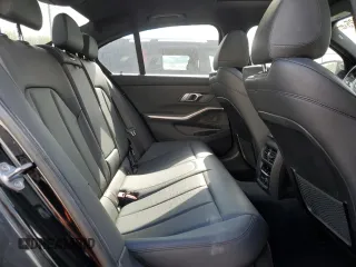 2019 BMW 3 Series 330i xDrive with VIN WBA5R7C56KAJ86097, listed as a Copart auction lot 53537325 with 76,636 mi miles and Salvage Title. Bid and sale history available at carsss.com. Image 10.