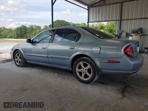 2000 Nissan Maxima GXE with VIN JN1CA31A1YT223132, listed as a Copart auction lot 60148655 with 269,258 mi miles and Salvage title. Bid and sale history available at DreamBid. Image 2.